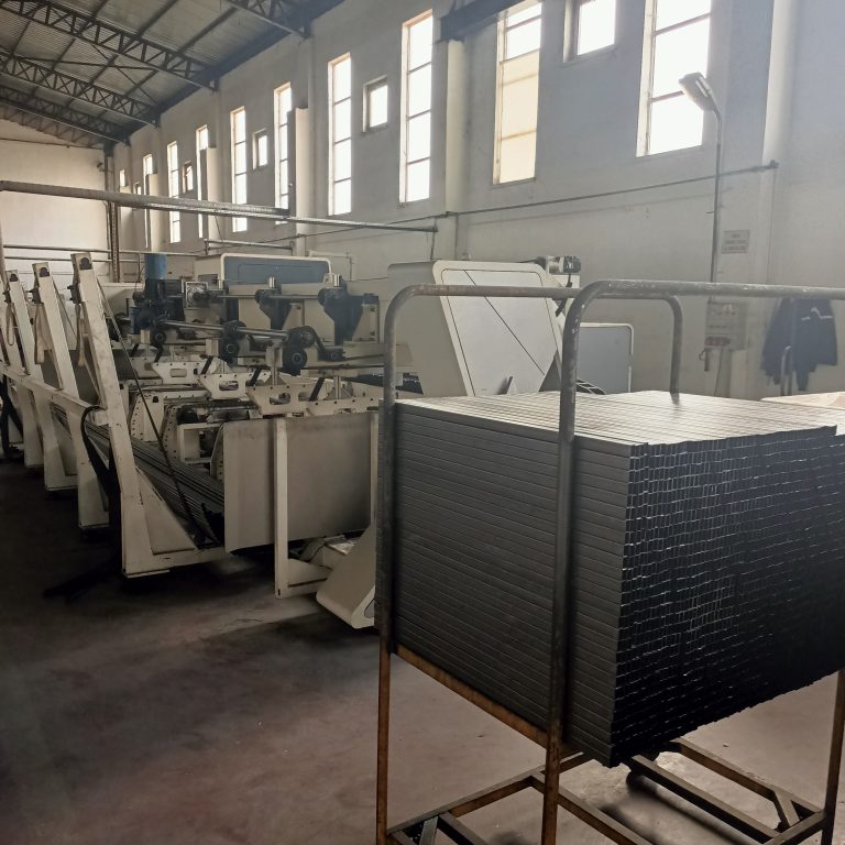 High-precision automated Bodor laser cutting machine processing steel profiles for bunk bed frames at Fano factory.