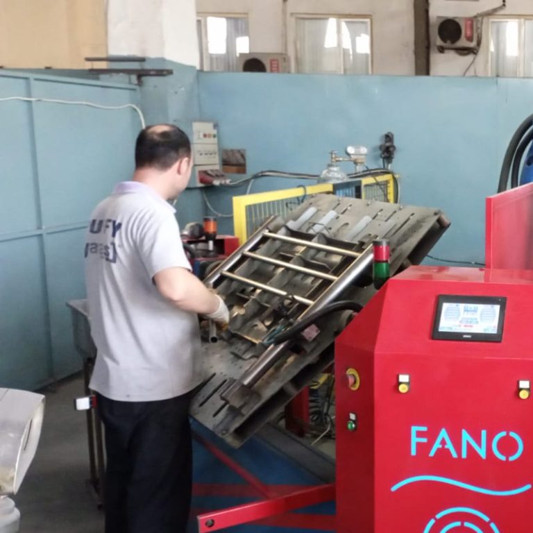 Advanced robotic arm performing precise MIG welding on commercial metal bunk bed frame joints for superior durability.